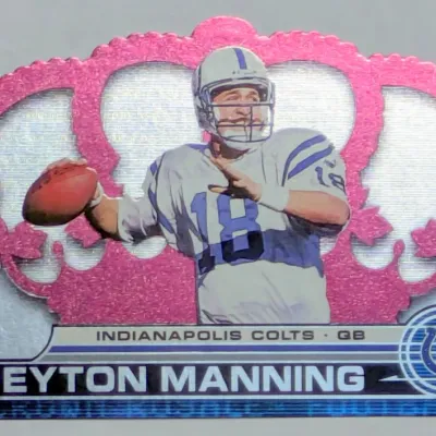 Peyton Manning Indianapolis Colts Pacific Crown Royale die-cut football trading card featuring a crown-shaped design and foil finish.