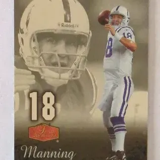 Peyton Manning Indianapolis Colts 1999 Flair Showcase football card featuring a dual action shot and helmet portrait design.