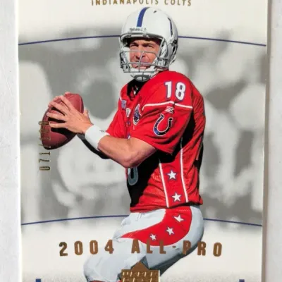 2005 Upper Deck NFL Rookie Debut Peyton Manning 2004 All-Pro serial-numbered trading card #071/100, featuring Manning in a Pro Bowl jersey.