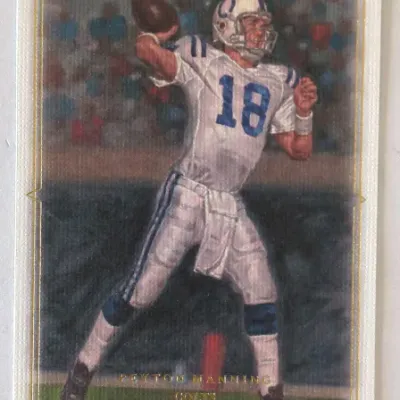 Upper Deck Masterpieces Peyton Manning Indianapolis Colts trading card featuring painted artwork and gold foil accents.