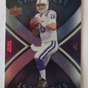 Upper Deck StarQuest Peyton Manning Indianapolis Colts football trading card featuring a iridescent die-cut design.