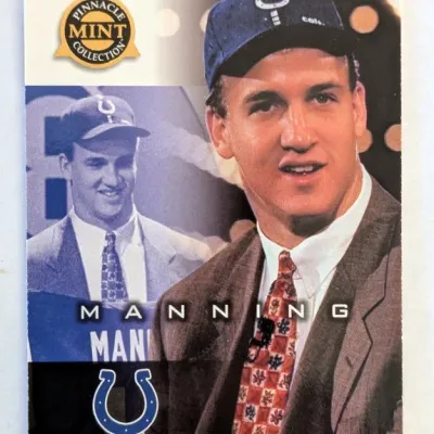 1998 Pinnacle Mint Collection Peyton Manning rookie football trading card featuring the Indianapolis Colts logo.