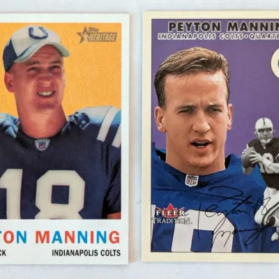 Pair of Peyton Manning Indianapolis Colts trading cards, including a Topps Heritage card and a Fleer Tradition card.