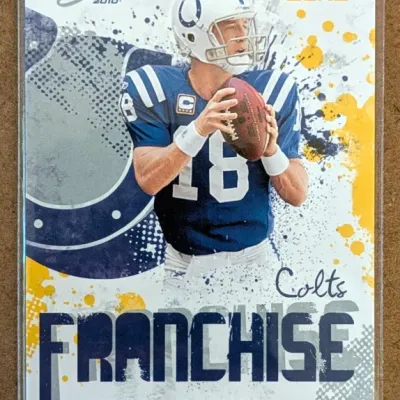 2010 Score Gold Zone Peyton Manning Franchise insert trading card in a protective sleeve, featuring him in his Indianapolis Colts uniform.