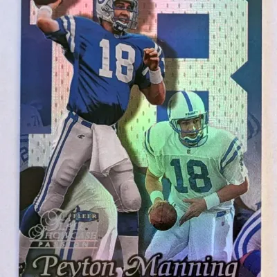 1998 Fleer Flair Showcase Passion Peyton Manning rookie trading card featuring holographic finish details.