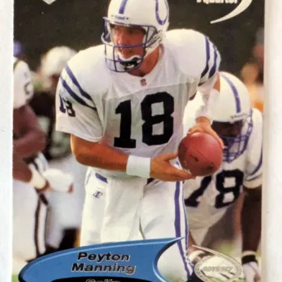 1998 Upper Deck Odyssey Peyton Manning 1st Quarter rookie trading card, featuring him in his Indianapolis Colts uniform.