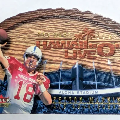 2001 Fleer Genuine Hawaii "O" Peyton Manning die-cut trading card featuring his Pro Bowl appearance at Aloha Stadium.