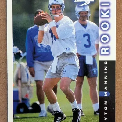 1998 Score Peyton Manning Rookie football card #233, featuring the quarterback in his Indianapolis Colts practice gear.