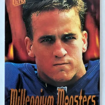 1999 Fleer Ultra Peyton Manning Millennium Monsters insert trading card, featuring a close-up portrait of the player.