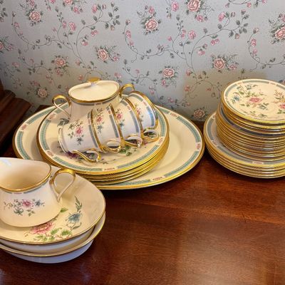 VintageLenox  fine china tea and dinnerware set featuring a floral pattern with gold trim, including teacups, saucers, a covered sugar...