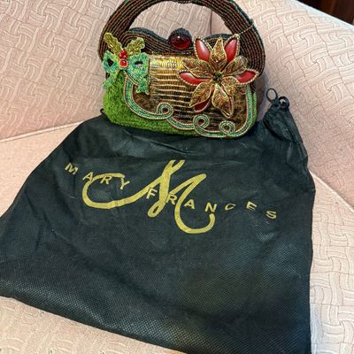 Mary Frances holiday-themed beaded handbag with poinsettia and holly embellishments, complete with original dust bag.