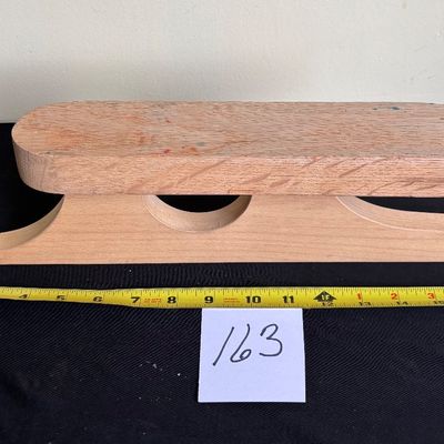 Dritz No. 695 Point Presser and Pounding Block, which is a 2-in-1 wooden Sewing Tool