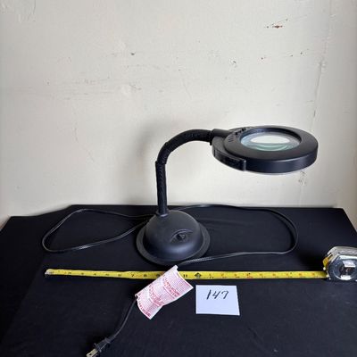 black gooseneck magnifying desk lamp