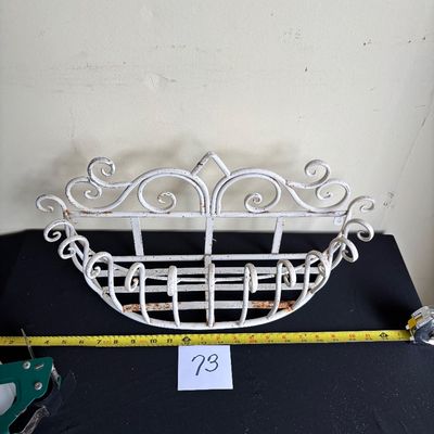 vintage-style white wrought iron wall planter basket