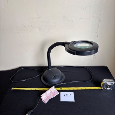 black gooseneck magnifying desk lamp
