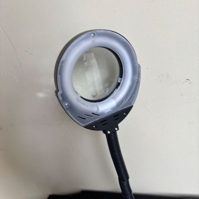 black gooseneck magnifying desk lamp