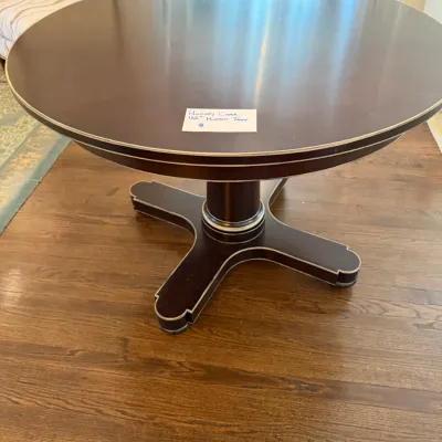 Sale Photo Thumbnail #239: Hickory Chair Company 42-inch round 'Hudson' pedestal dining table in a dark finish with contrast trim detailing.