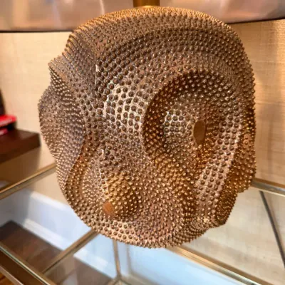 Sale Photo Thumbnail #210: Contemporary accent table lamp featuring a textured, beaded bronze-finish spherical base with organic, flowing contours.