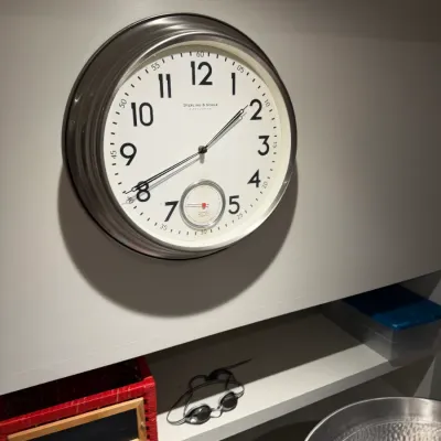 Sale Photo Thumbnail #266: Sterling & Noble metallic wall clock featuring an integrated thermometer sub-dial.