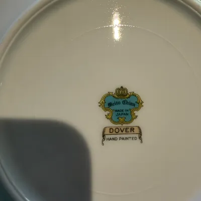 Sale Photo Thumbnail #192: Underside maker's mark on a vintage Meito China hand-painted plate in the Dover pattern, made in Japan.