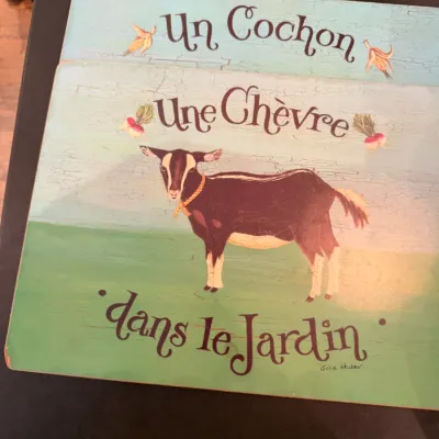 Sale Photo Thumbnail #198: Pair of French country-style placemats featuring distressed farm animal illustrations and French text by Julie Huber.