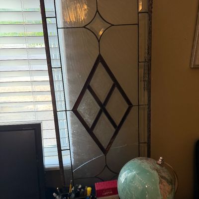 Large rectangular leaded clear and textured glass window panel with a central geometric diamond design.