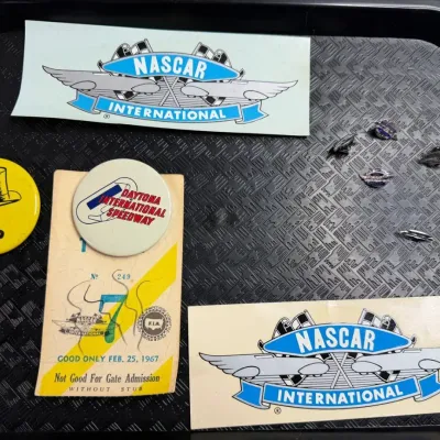 Rare Vintage NASCAR Lot: 1967 Daytona Ticket Stub, International Decals & VIP Pin
