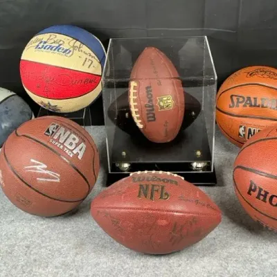 Autographed Basketball & Football Memorabilia Lot with Display Case