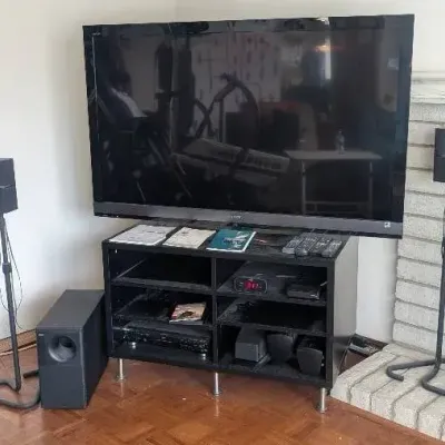 Sony Bravia 65" LED HDTV, Bose Audio & Sanus Furniture