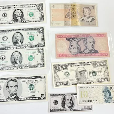 US Uncirculated Bills, Foreign Currency, And Mock Bills
