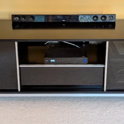 Sale Photo Thumbnail #18: Entertainment Stand - Contemporary Black Media Console.Contemporary black entertainment stand with a wide top, enclosed side compartments, and an open center shelf for media components. This media console provides organized storage for a television, sound