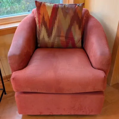 Sale Photo Thumbnail #24: Upholstered Armchair - Best Chairs Red Accent Chair

Upholstered red armchair by Best Chairs Inc. with rounded arms, a matching upholstered footrest base, and a coordinating geometric accent cushion. This lounge chair has a soft, tailored profile suited t