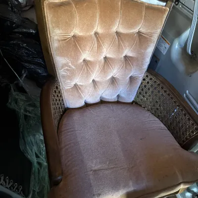 Sale Photo Thumbnail #110: Vintage French Provincial style armchair with tufted velvet upholstery and cane side panels.