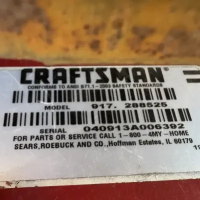 Sale Photo Thumbnail #139: Craftsman equipment identification label displaying model number 917.288525 and serial number 040913A006392.