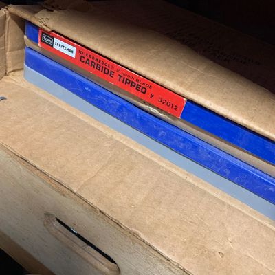 Vintage Sears Craftsman 10-inch Kromedge carbide-tipped 30-tooth saw blade in its original packaging.