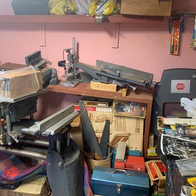 Workshop area featuring Shopsmith power tools, a drill press attachment, jointer, metal toolboxes, and assorted vintage woodworking...