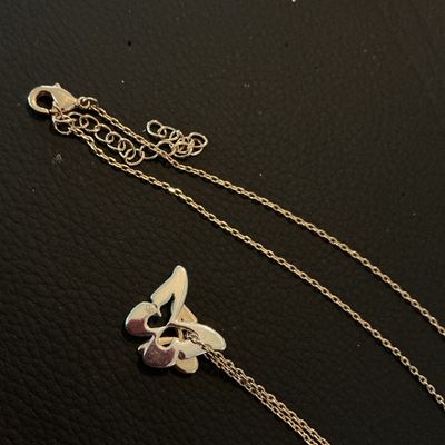 Sale Photo Thumbnail #179: A silver-tone cable chain necklace featuring a layered butterfly pendant engraved with the word 'Sisters'. Includes an extender chain with a lobster claw clasp. Appears to be in good pre-owned condition with light surface wear.