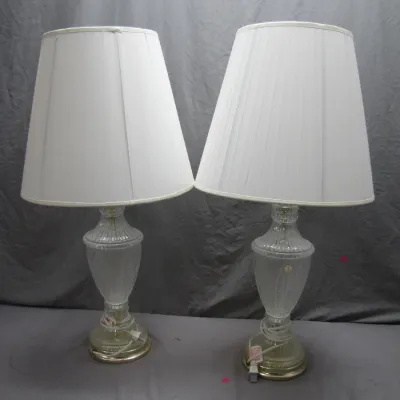 Sale Photo Thumbnail #196: Pair of vintage crystal table lamps featuring frosted glass urn-shaped bases and tall white pleated fabric shades.