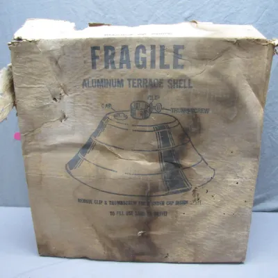 Sale Photo Thumbnail #192: Vintage original box for an Aluminum Terrace Shell umbrella base, showing heavy wear and tears.