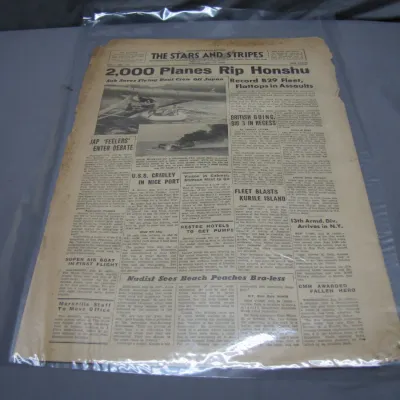 Sale Photo Thumbnail #199: Vintage July 25, 1945 edition of The Stars and Stripes military newspaper, protected in a clear plastic sleeve.