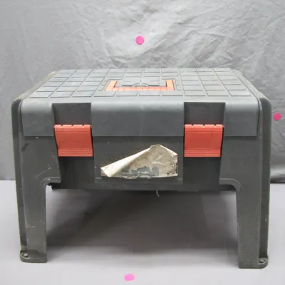 Sale Photo Thumbnail #181: Heavy-duty plastic step stool toolbox with red latches and carrying handle, showing light wear.