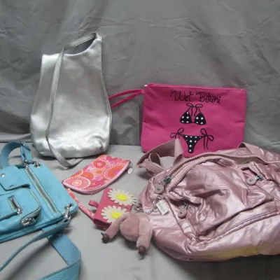 Sale Photo Thumbnail #228: Collection of women's handbags and pouches, including a metallic pink Kipling shoulder bag with monkey keychain, light blue leather crossbody bag, metallic silver shoulder bag, and a pink canvas 'Wet Bikini' zippered pouch.