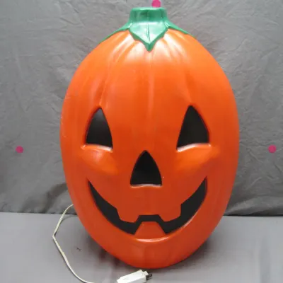 Sale Photo Thumbnail #122: Vintage illuminated blow mold jack-o'-lantern Halloween decoration with attached electric cord.