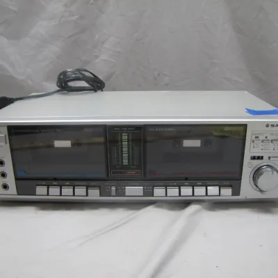 Sale Photo Thumbnail #222: Vintage Sanyo synchronized dual cassette deck component with high-speed dubbing, Dolby NR, and peak level meters, circa 1980s.
