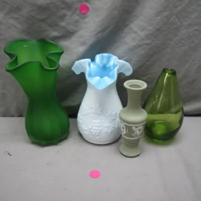 Sale Photo Thumbnail #106: Collection of vintage glass and pottery vases, including Fenton-style ruffled milk glass, a green satin stretch vase, a green glass tear drop vase, and a small Wedgwood jasperware vase.
