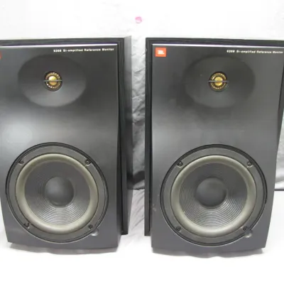 Sale Photo Thumbnail #194: Pair of JBL model 6208 bi-amplified reference studio monitor speakers in black cabinets.