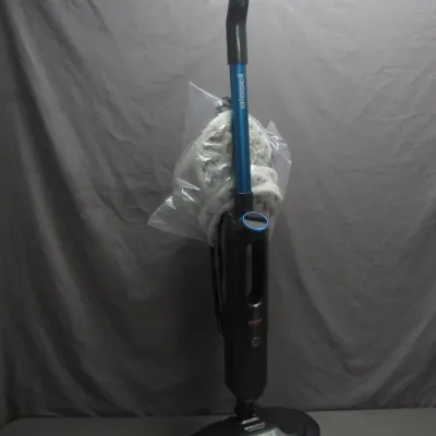 Sale Photo Thumbnail #285: Bissell SpinWave hard floor mop in black and blue finish, complete with extra cleaning pads stored in a plastic bag attached to the handle.