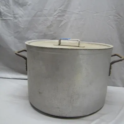 Sale Photo Thumbnail #219: Large vintage aluminum stock pot with matching lid and dual side handles.