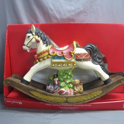 Sale Photo Thumbnail #23: Merry Brite fiber optical polyresin rocking horse Christmas decoration in original packaging.