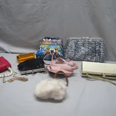 Sale Photo Thumbnail #45: Collection of women's fashion handbags and evening clutches, featuring various materials and patterns including faux snakeskin, zebra print, beaded black, faux fur, and metallic gold.